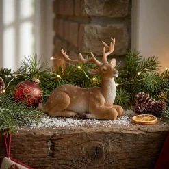 Cerf couché en résine