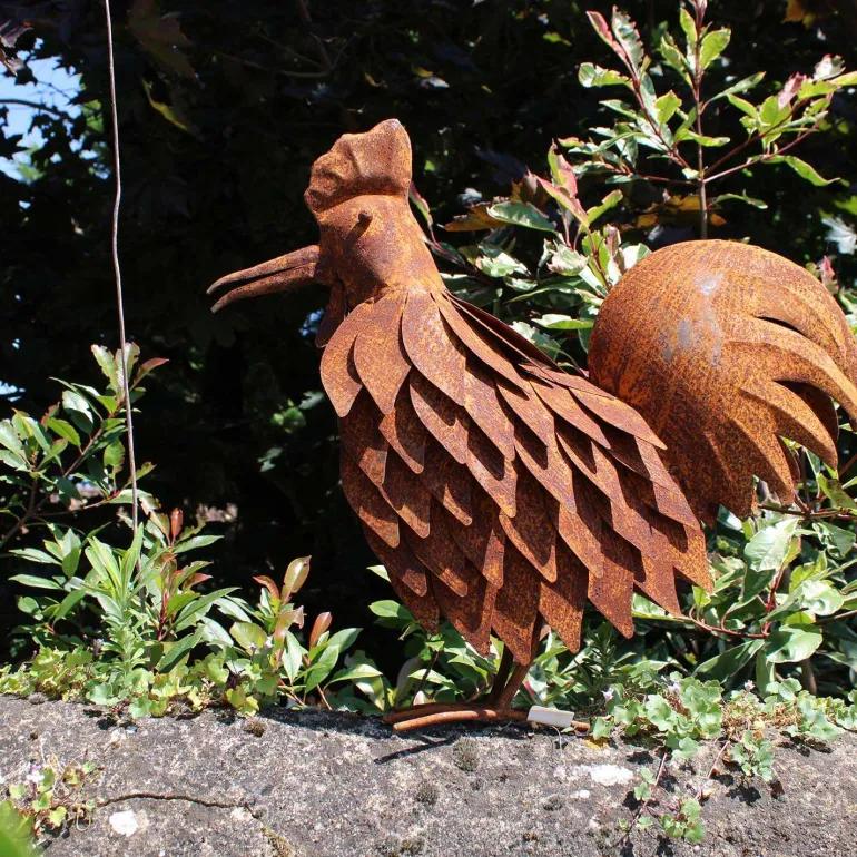Coq en fer forgé rouillé