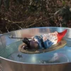 Nain de jardin en résine ballade sur l'eau (Barque allongé)