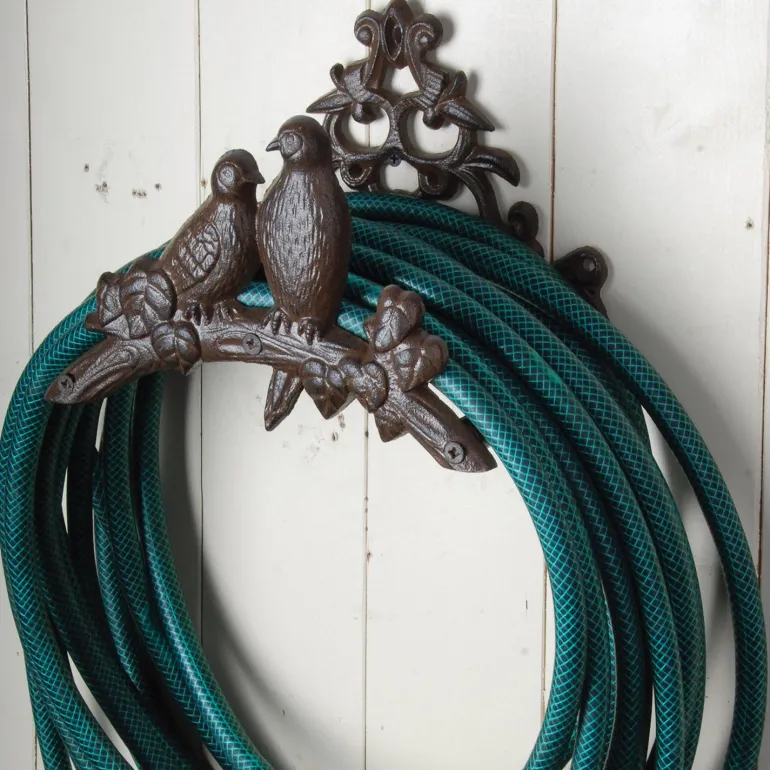 Porte tuyau fonte oiseaux