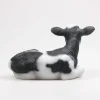 Vache couchée en résine 34 x 21 x 21.5 cm