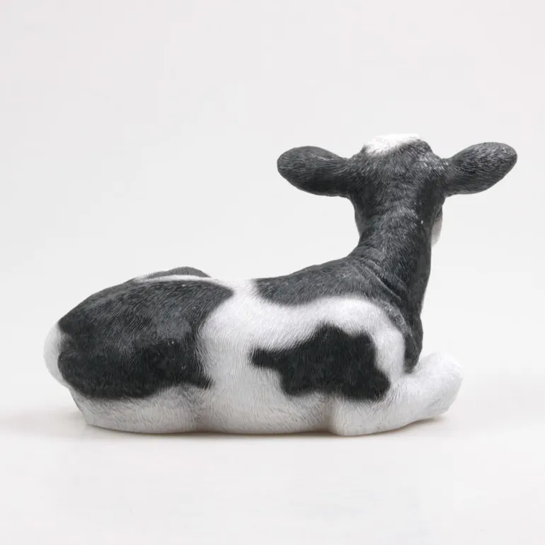 Vache couchée en résine 34 x 21 x 21.5 cm